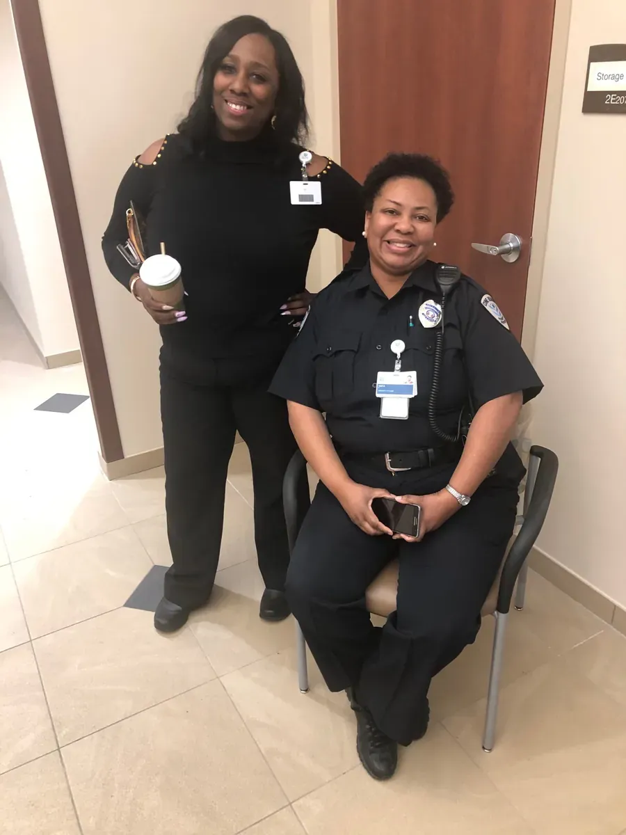 HealthPark valet attendant assisting hospital security